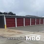 Mini Storage Building with Red Doors